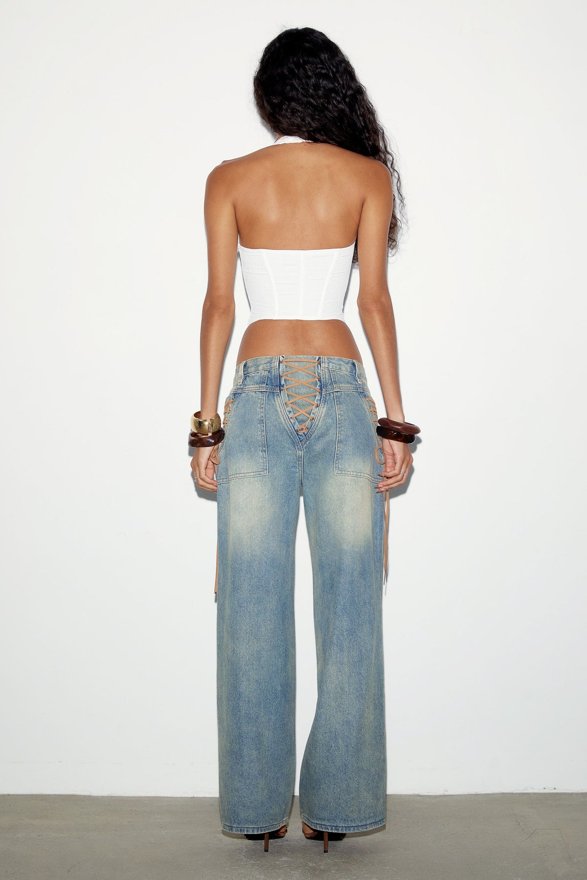 Back view of the Regan Jeans showing the lace-up detail across the back